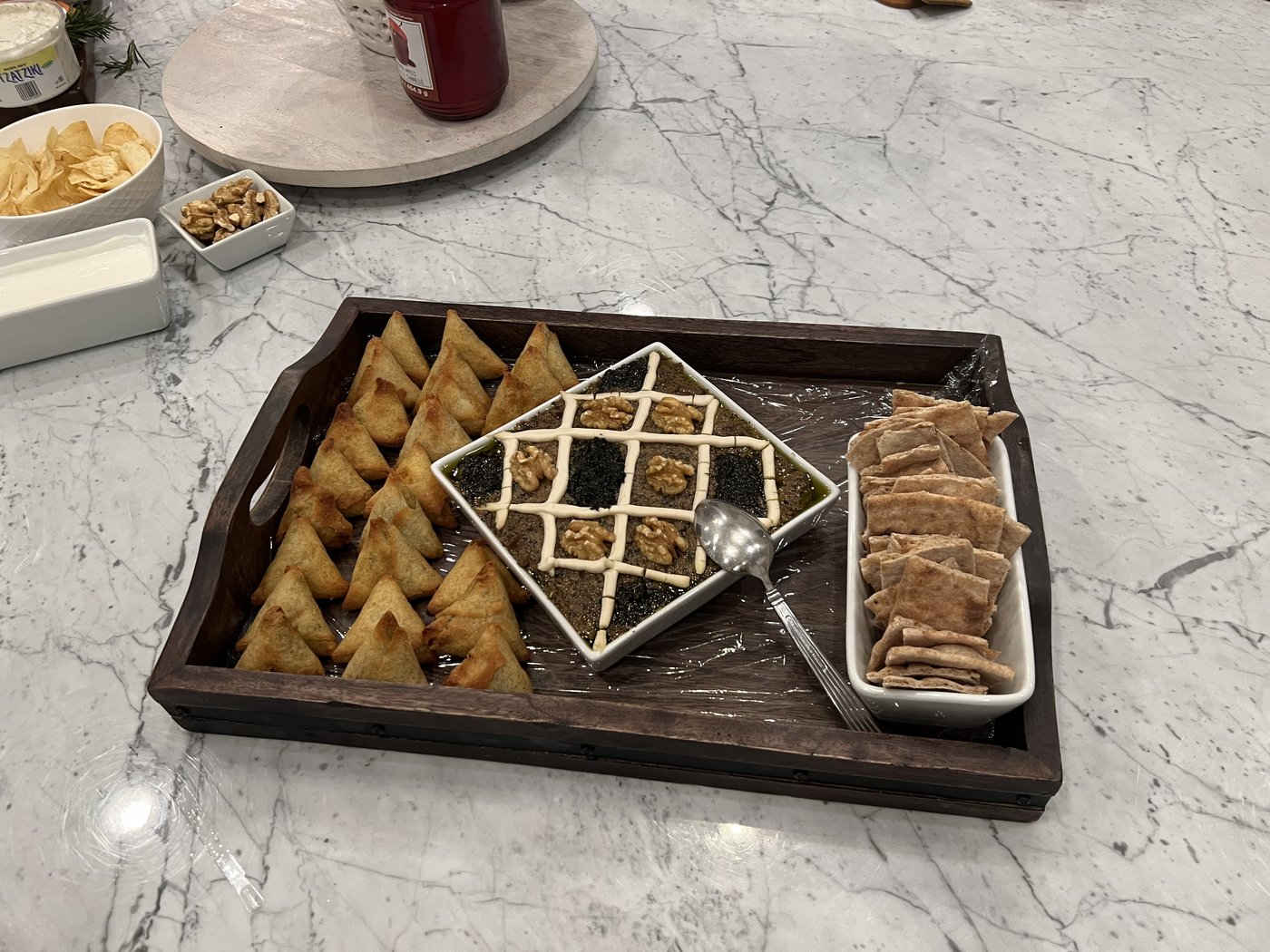 The Classic — overhead detail of charcuterie board with cheeses and meats