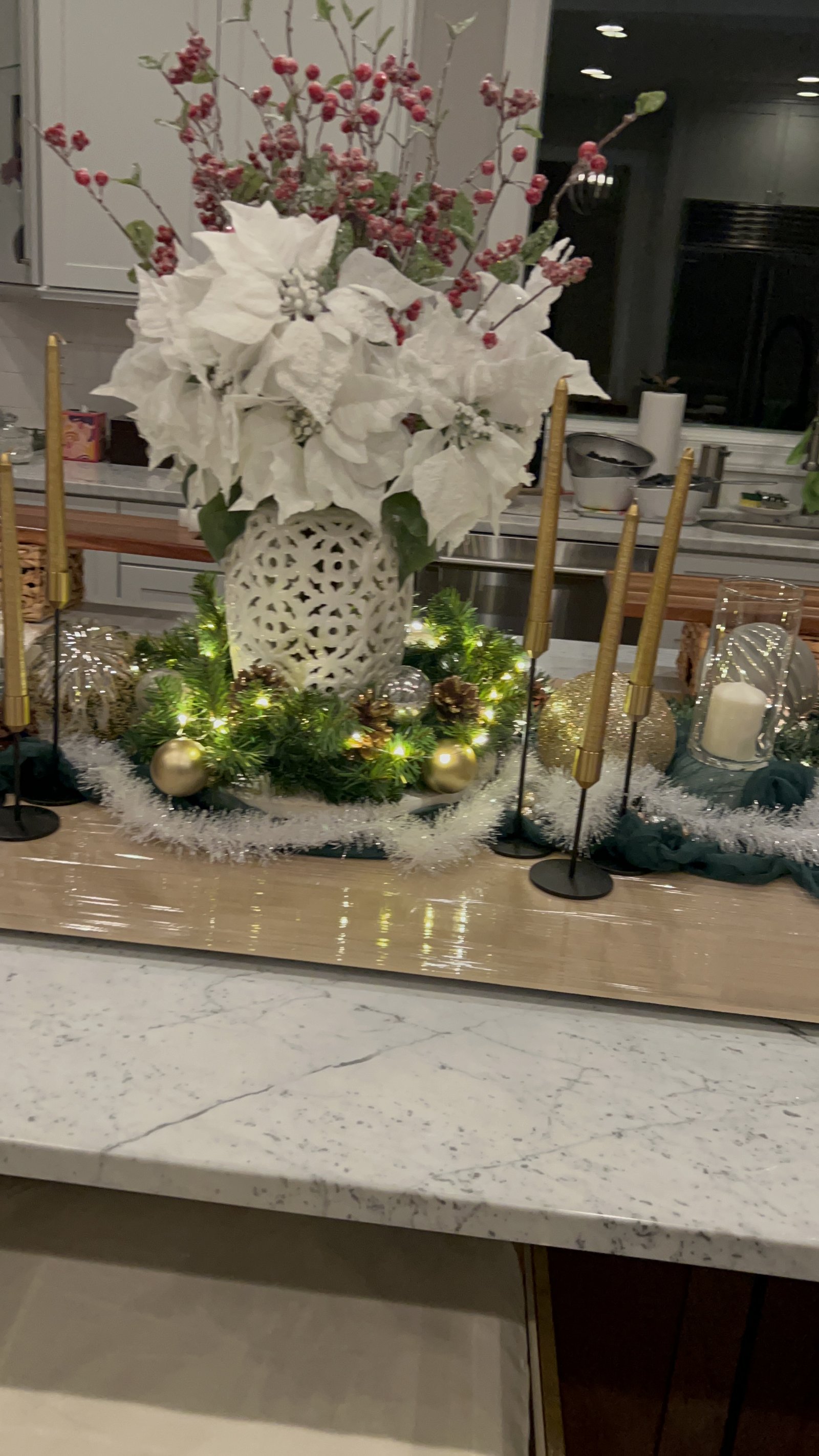 The Bloom — spring board with lemons, grapes, candles, and floral centerpiece