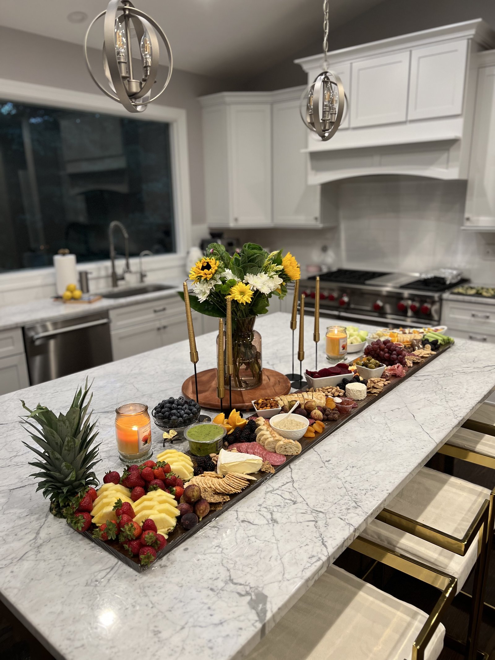 The Paddle — wooden paddle board with strawberries, blackberries, meats, and dip